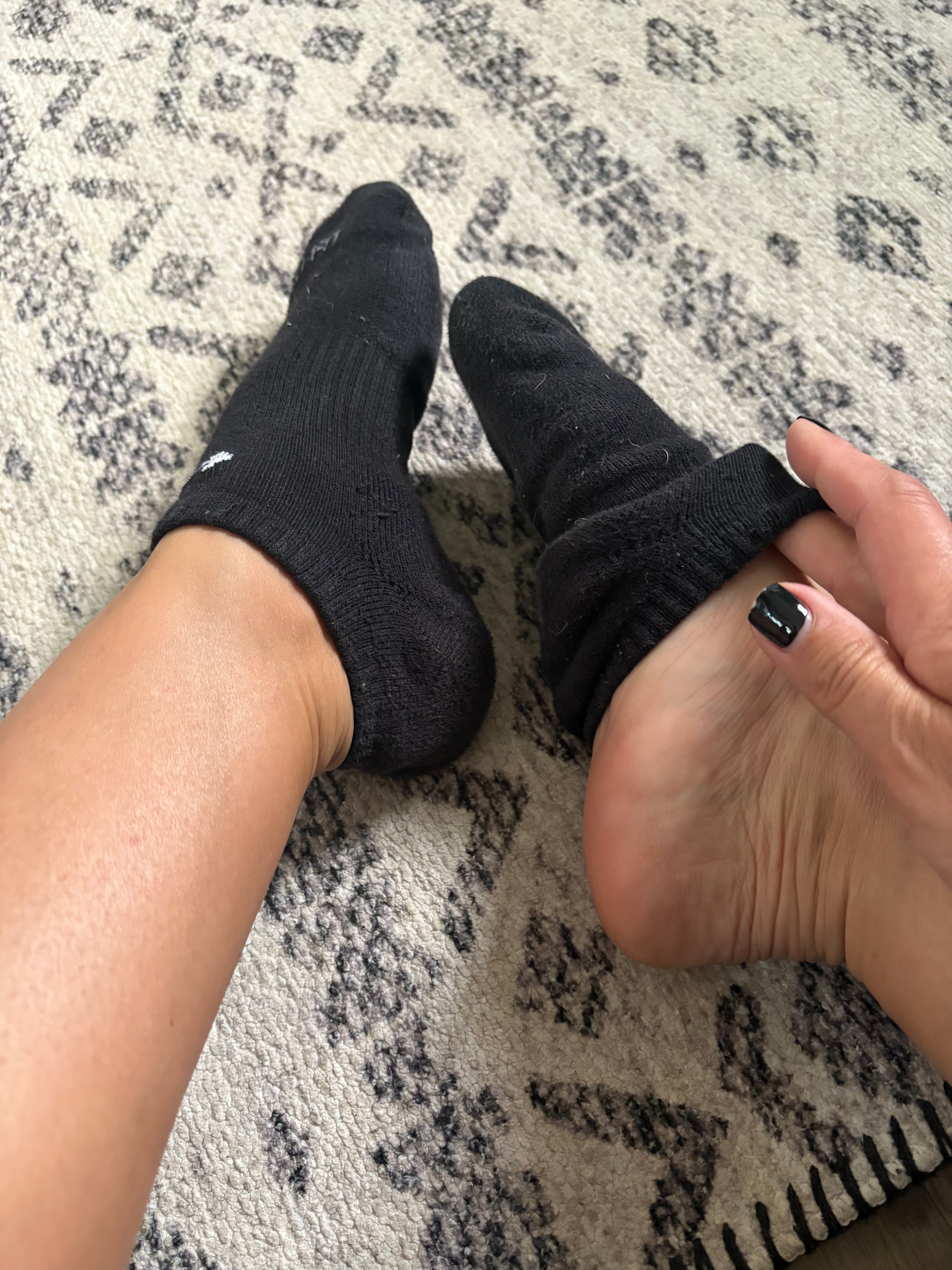 Well worn/used black Nike women’s ankle socks