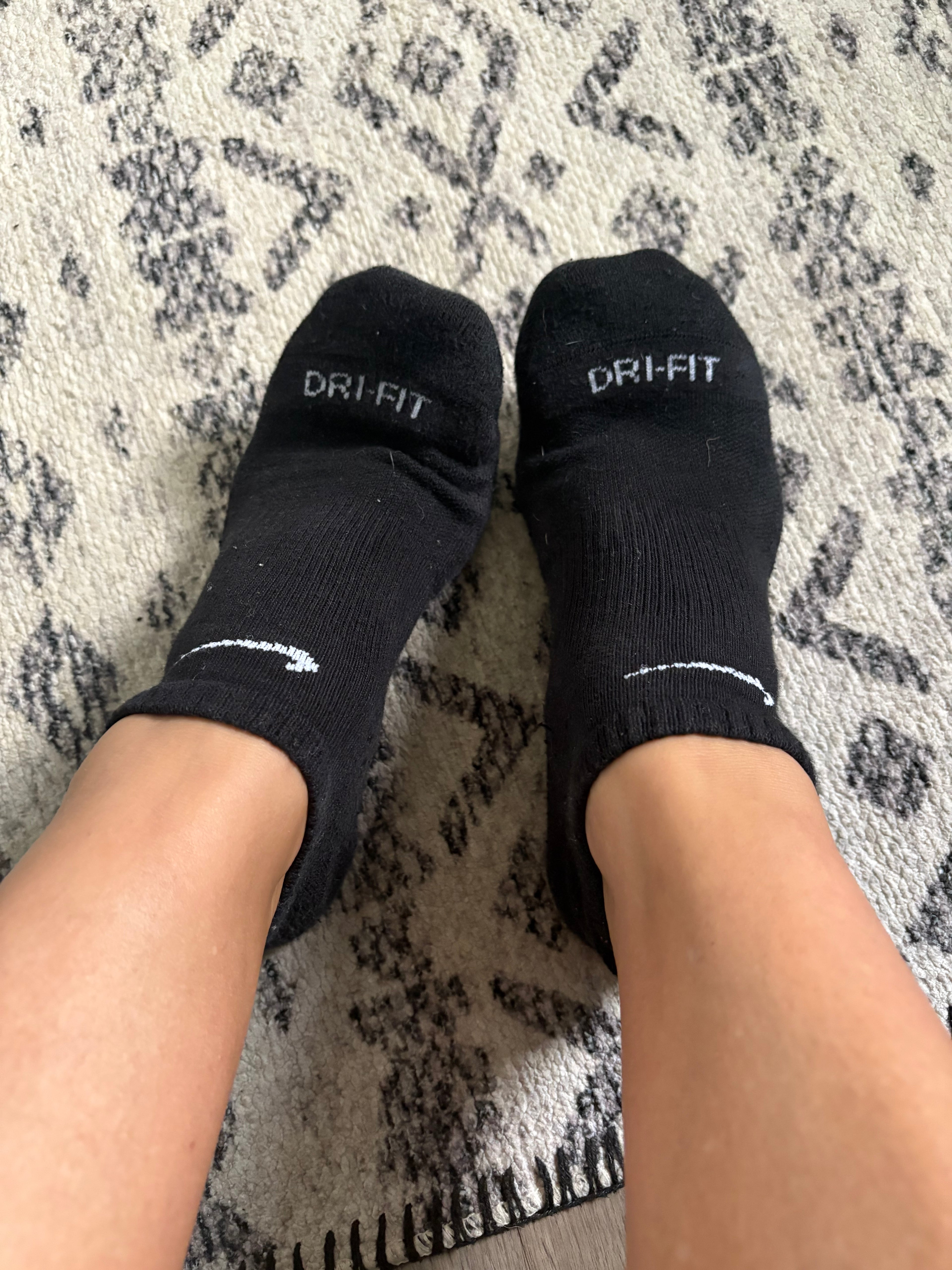 Well worn/used black Nike women’s ankle socks